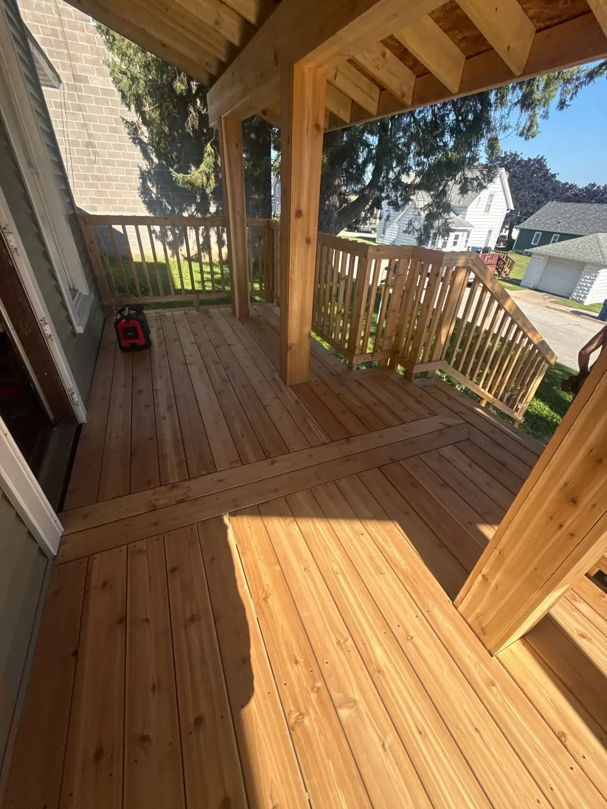 New cedar deck with timber posts and built in bench seating